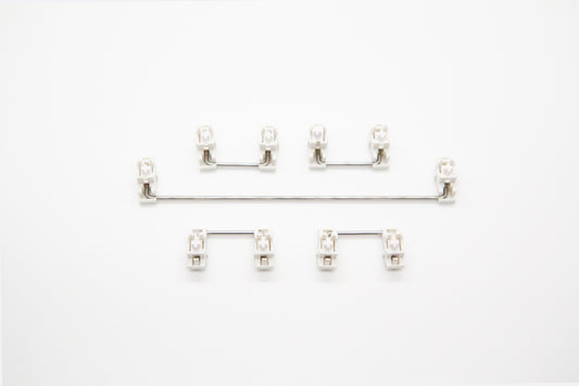 Overhead shot of PCB mounted white mechanical keyboard Durock stabilizer kit in 7u configuration with screws and washers