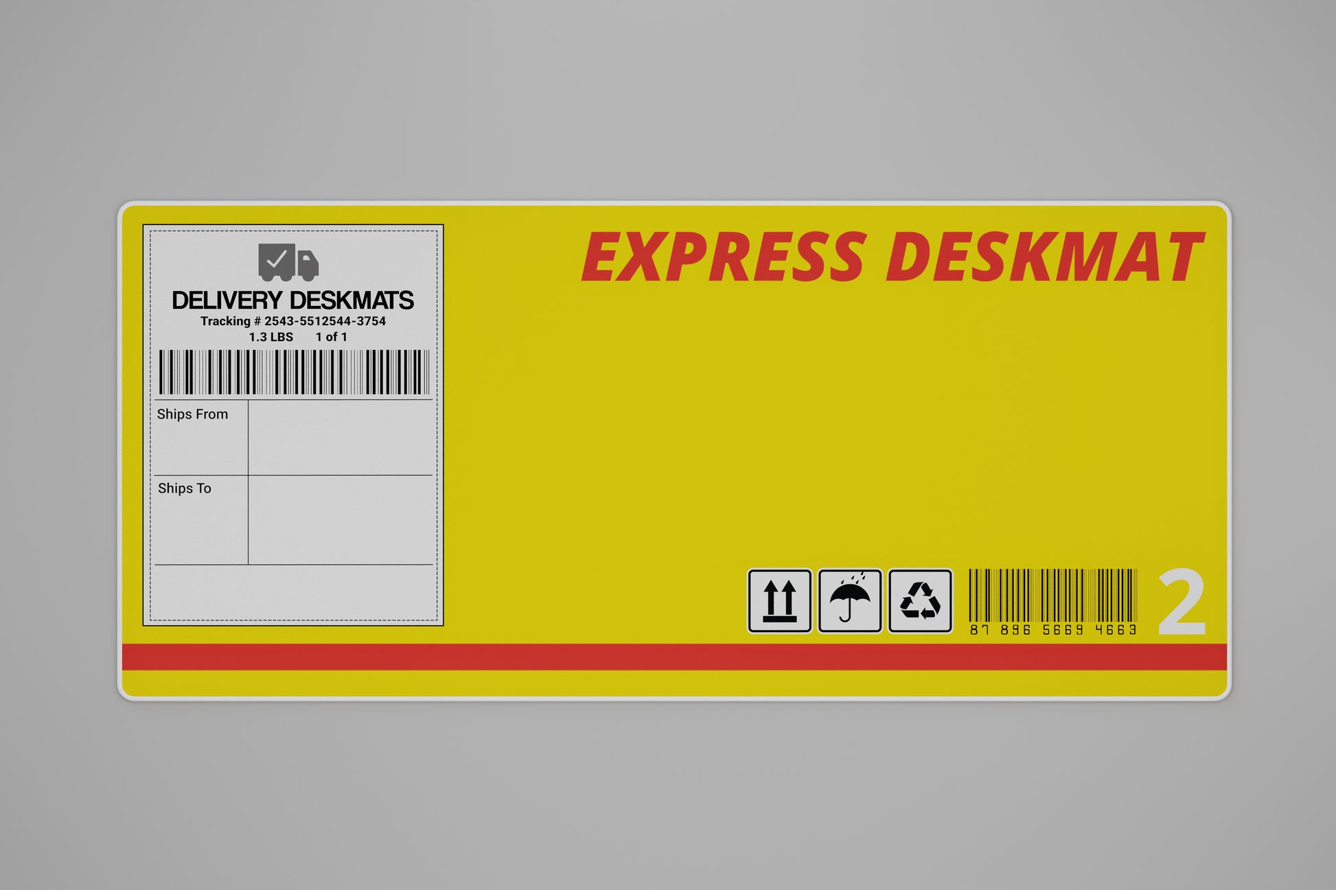 Overhead shot of a large 900 by 400 millimeter mousepad with a yellow express delivery shipping theme