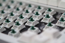 Load image into Gallery viewer, Close-up shot of BBN Linear switches in the central area of a keyboard with keycaps removed
