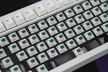 Load image into Gallery viewer, Close-up shot of BBN Linear switches in a keyboard with keycaps removed
